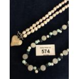 TWO SINGLE STRAND BEAD NECKLACES, A FRESH WATER PEARL WITH SILVER HEART CLASP AND A QUARTZ AND PEARL