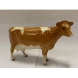 A BESWICK GUERNSEY COW
