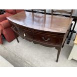 AN INLAID MAHOGANY BOW FRONT SIDEBOARD WITH THREE DRAWERS