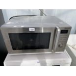 A JOHN LEWIS STAINLESS STEEL 900 WATT MICROWAVE - IN WORKING ORDER