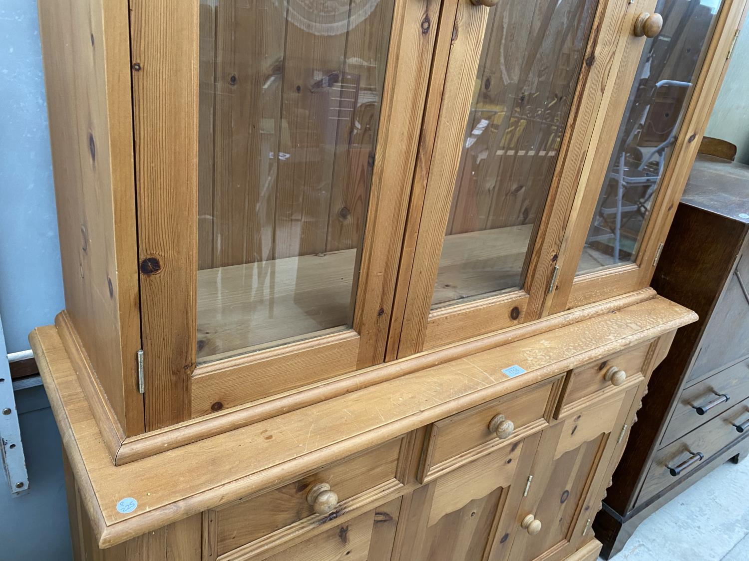 A PINE CABINET WITH THREE DOORS, THREE DRAWERS AND THREE UPPER GLAZED DOORS - Image 3 of 4