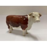 A BESWICK HEREFORD COW CHAMPION OF CHAMPIONS
