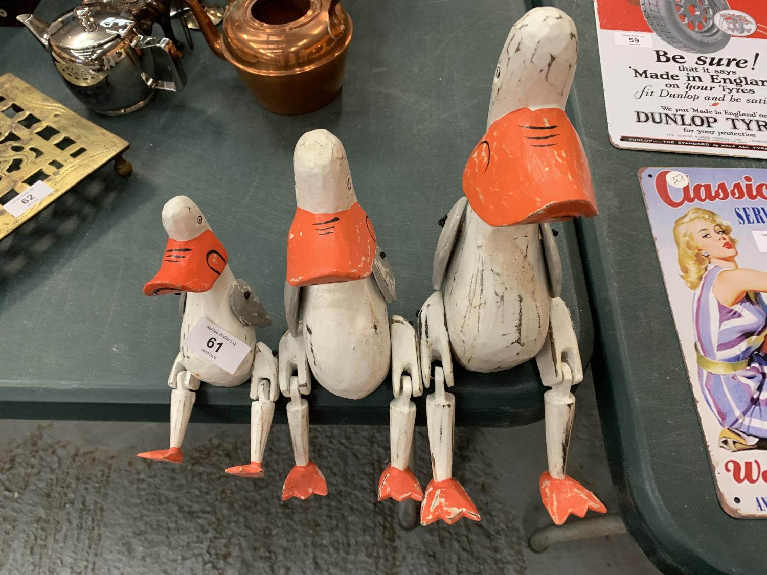 A GRADUATED SET OF THREE VINTAGE STYLE DUCK PUPPETS