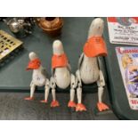 A GRADUATED SET OF THREE VINTAGE STYLE DUCK PUPPETS