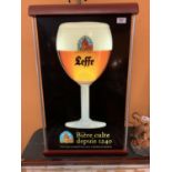 A LARGE LIGHT UP LEFFE BEER ADVERTISING SIGN IN WORKING ORDER