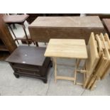 A SMALL HEAVY PINE CABINET WITH ONE DRAWER AND A SET OF FOUR BEECH FOLDING TABLES