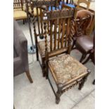 TWO CARVED OAK DINING CHAIRS WITH BARLEY TWIST COLUMNS AND STRETCHER RAIL