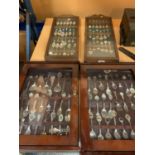 FOUR WOODEN DISPLAY CABINETS CONTAINING VARIOUS COLLECTABLE SPOONS TO INCLUDE PLACES, EVENTS ETC