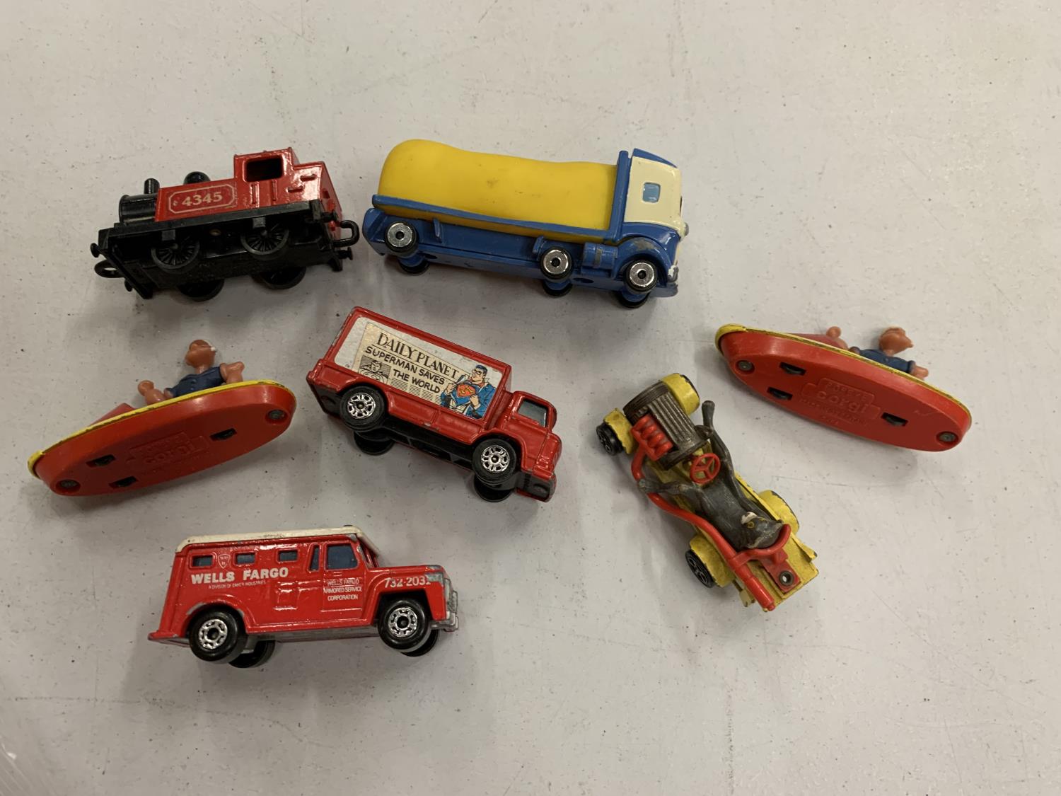 SEVEN VARIOUS TOY CARS AND BOATS