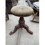 A MAHOGANY PIANO STOOL ON CARVED TRIPOD SUPPORT
