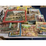 A LARGE COLLECTION OF VINTAGE WOODEN JIGSAWS