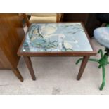 A SMALL MAHOGANY TABLE WITH SWAN TAPESTRY TOP