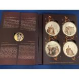 A BOXED SET OF FIVE LARGE COINS DEPICTING QUEEN VICTORIA