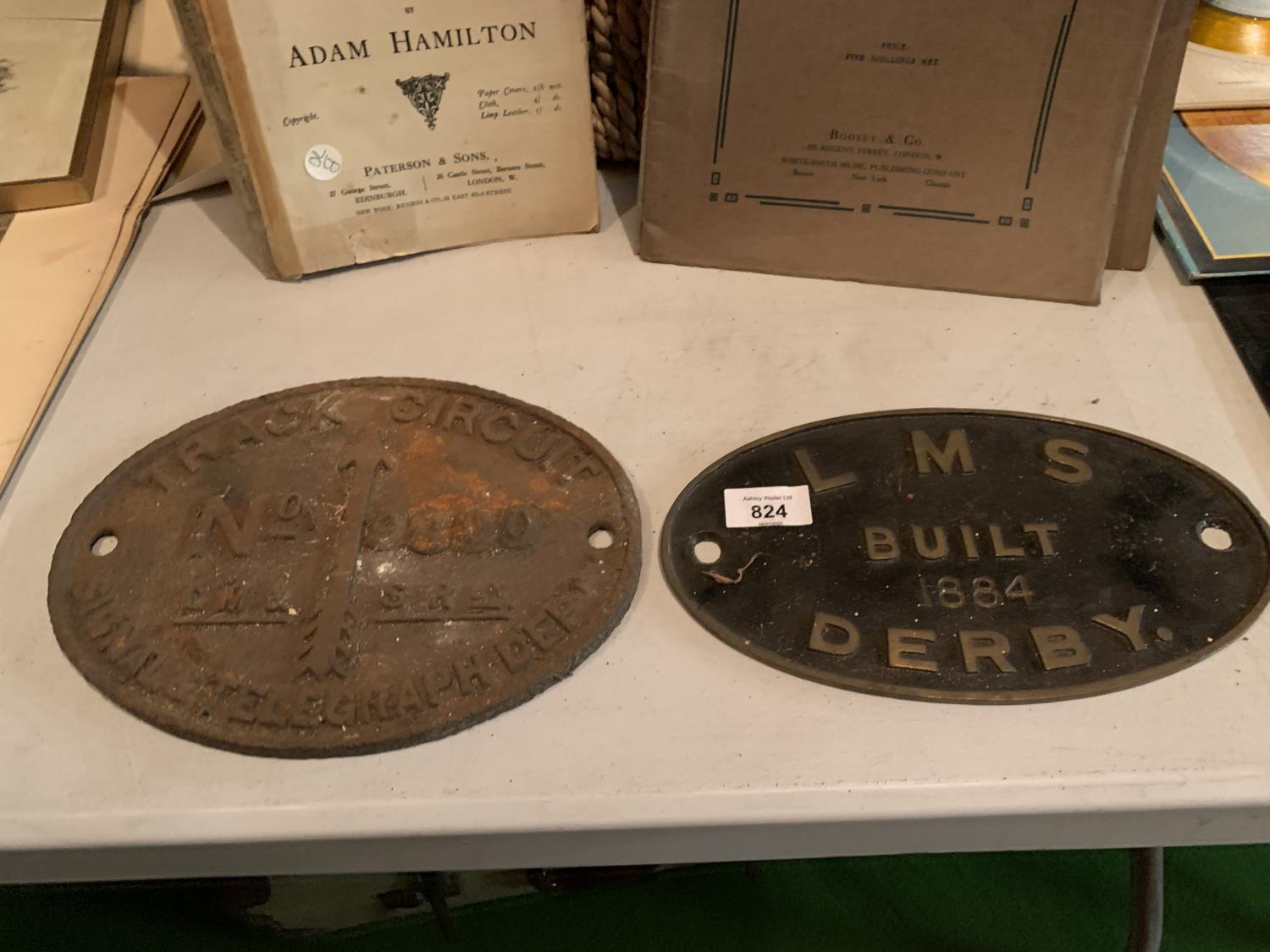 TWO CAST PLATES, ONE SAYING LMS BUILT 1884 DERBY AND THE OTHER TRACK CIRCUIT