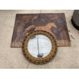 A COPPER HORSE PLAQUE AND A CIRCULAR GILT FRAMED MIRROR