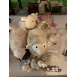 A COLLECTION OF CERAMIC AND SOFT TOY SHEEP