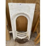 A VICTORIAN CAST IRON FIREPLACE AND GRATE