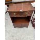 A SMALL MAHOGANY CABINET WITH TWO DOORS AND TWO DRAWERS