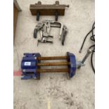 A WOOD VICE AND THREE VARIOUS CLAMPS