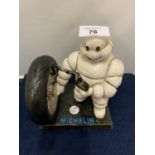 A CAST IRON MICHELIN MAN FIGURE