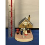 A BOXED CAMBERWICK GREEN POST OFFICE FIGURE (9.5CM)