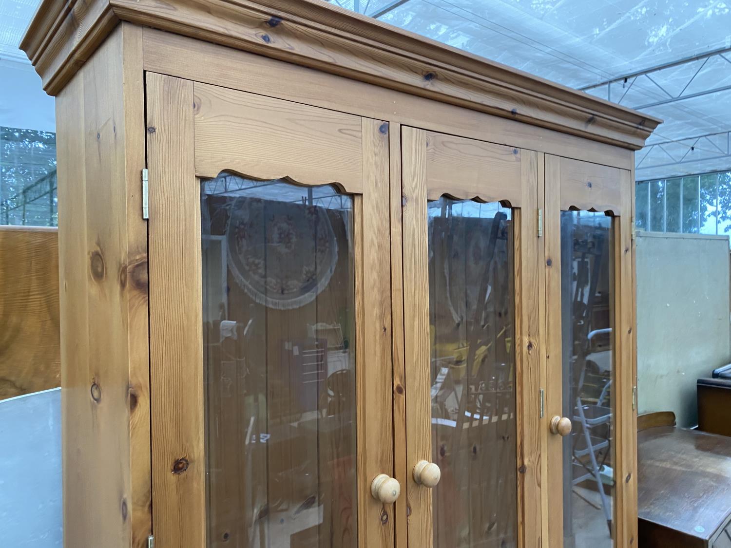 A PINE CABINET WITH THREE DOORS, THREE DRAWERS AND THREE UPPER GLAZED DOORS - Image 2 of 4