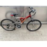 A VORTEX STORM MOUNTAIN BIKE WITH 21 SPEED SHIMANO GEAR SYSTEM