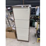 A FOUR DRAWER METAL FILING CABINET