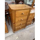 A PINE CHEST OF FOUR DRAWERS