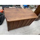 A PANELLED OAK BLANKET CHEST