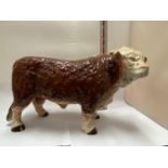 A LARGE BUTCHER'S SHOP CERAMIC HEREFORD BULL