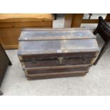 A WOOD BOUND TRAVEL TRUNK