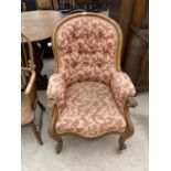 A MAHOGANY PARLOUR ARMCHAIR ON CABRIOLE SUPPORTS