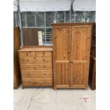 A PINE CHEST OF TWO SHORT AND FOUR LONG DRAWERS AND A PINE WARDROBE