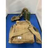 A GAS MASK WITH WEBBING CARRY CASE