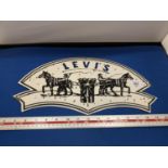 A LEVI'S ENAMEL SIGN