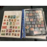 A QUANTITY OF CHINESE STAMPS