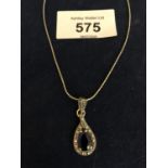 SILVER MARKED BLUE PASTE AND MARCASITE TEARDROP PENDANT AND CHAIN. APPROX TOTAL WEIGHT 5 GRAMS