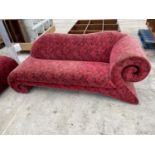 A SCROLLED CHAISE LONGUE WITH RED ROSE UPHOLSTERY