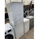 A FRIDGE FREEZER - IN WORKING ORDER