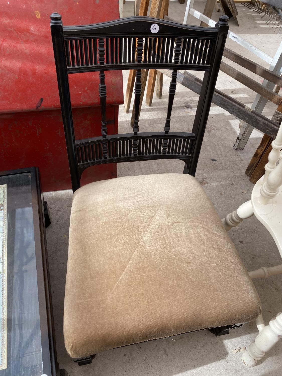 THREE CHAIRS - AN EBONISED NURSING CHAIR, A WHITE CAPTAIN'S CHAIR AND A CARVED OAK DINING CHAIR - Image 2 of 7