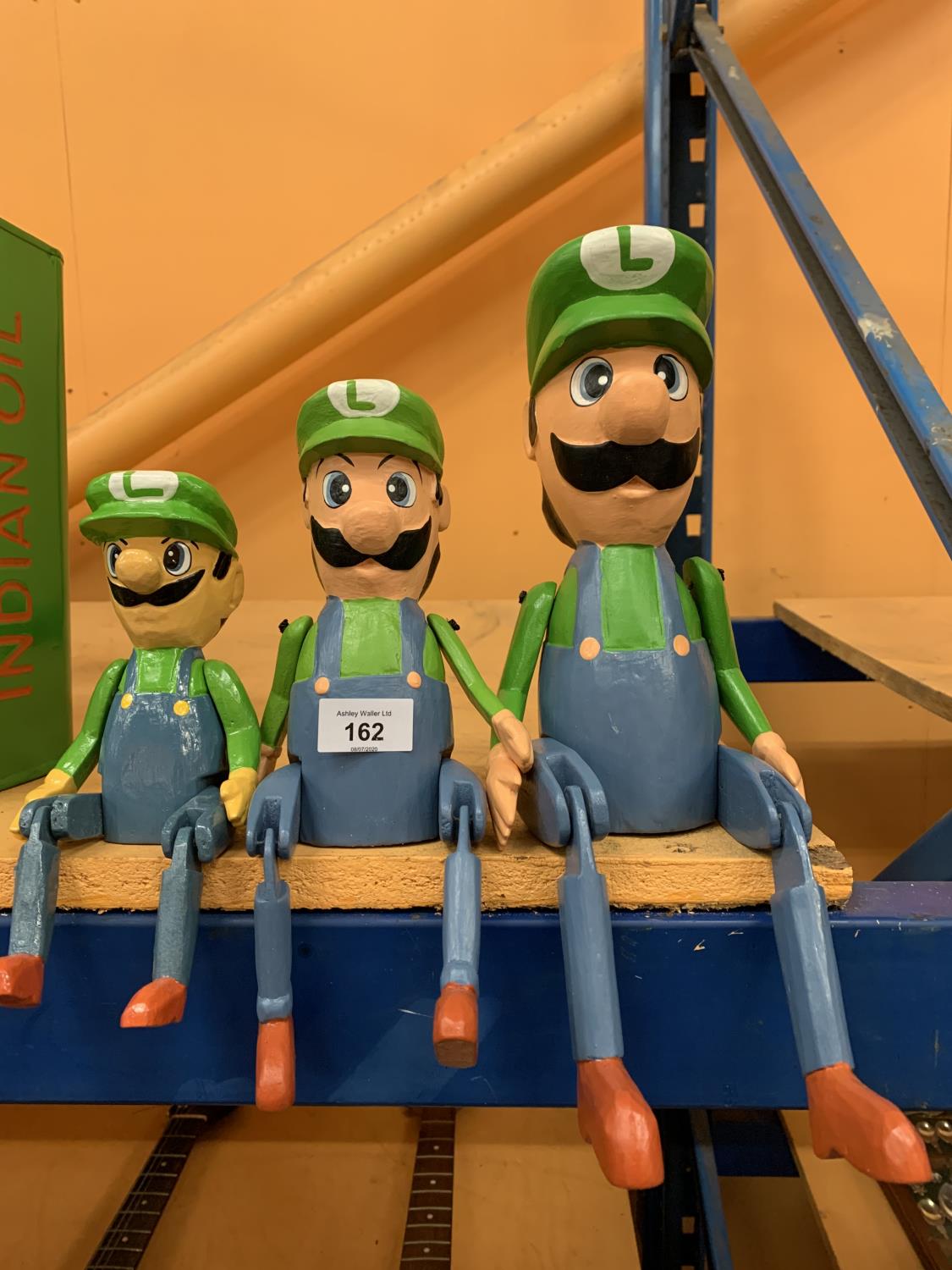 A GRADUATED SET OF THREE VINTAGE STYLE LUIGI SUPER MARIO SHELF PUPPETS