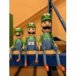 A GRADUATED SET OF THREE VINTAGE STYLE LUIGI SUPER MARIO SHELF PUPPETS