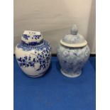 TWO BLUE AND WHITE PAINTED LIDDED JARS ONE A/F (CRACK)