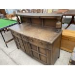 AN F D WELTERS OAK SIDEBOARD WITH TWO DOORS, THREE DRAWERS AND SPLASHBACK