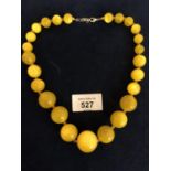 A YELLOW AMBER COLOURED GRADUATED BEAD NECKLACE 18 INCH. APPROX TOTAL GROSS WEIGHT 68 GRAMS