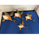 A BESWICK SET OF FOUR GRADUATED MALLARD WALL PLAQUES