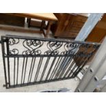 A PAIR OF WROUGHT IRON GARDEN GATES