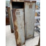 A VINTAGE STEEL TWO DOOR CABINET