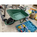 AN AS NEW HEAVY DUTY WHEELBARROW WITH INFLATABLE TYRE